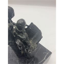 20th century bronze sculpture, modelled as two figures reading, upon a black and white marble base, H14cm