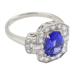 18ct gold oval tanzanite, round and baguette cut diamond cluster ring, stamped 750, tanzanite approx 1.85 carat, total diamond weight approx 0.70 carat