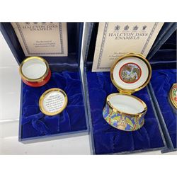 Eight Christmas themed Halcyon Days enamel boxes, and a Halcyon Days enamel bonbonniere modelled as a snowman, each in fitted box 