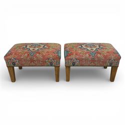 Pair of needlepoint footstools, retailed by The Bespoke Footstool Co, brass studded trim on tapered oak supports