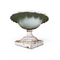 Coalbrookdale - pair of 19th century cast iron petal rim urns, squat form on square plinth, finished in distressed white paint, design registration number 133334, first registered 19 september 1860, number 19 in the Coalbrookdale Castings Catalogue (see illustration)