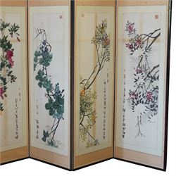Large 20th century eight panel folding screen decorated with Chinese watercolours of blossoming trees, the watercolours backed onto foliate patterned silk panels, each inscribed and signed with artists seal, with navy fabric to the opposing side, each panel measuring 47cm x 163cm