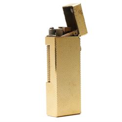 Dunhill - Rollagas lighter, gilt metal with engine-turned decoration and ribbed thumbpiece, H6.5cm 