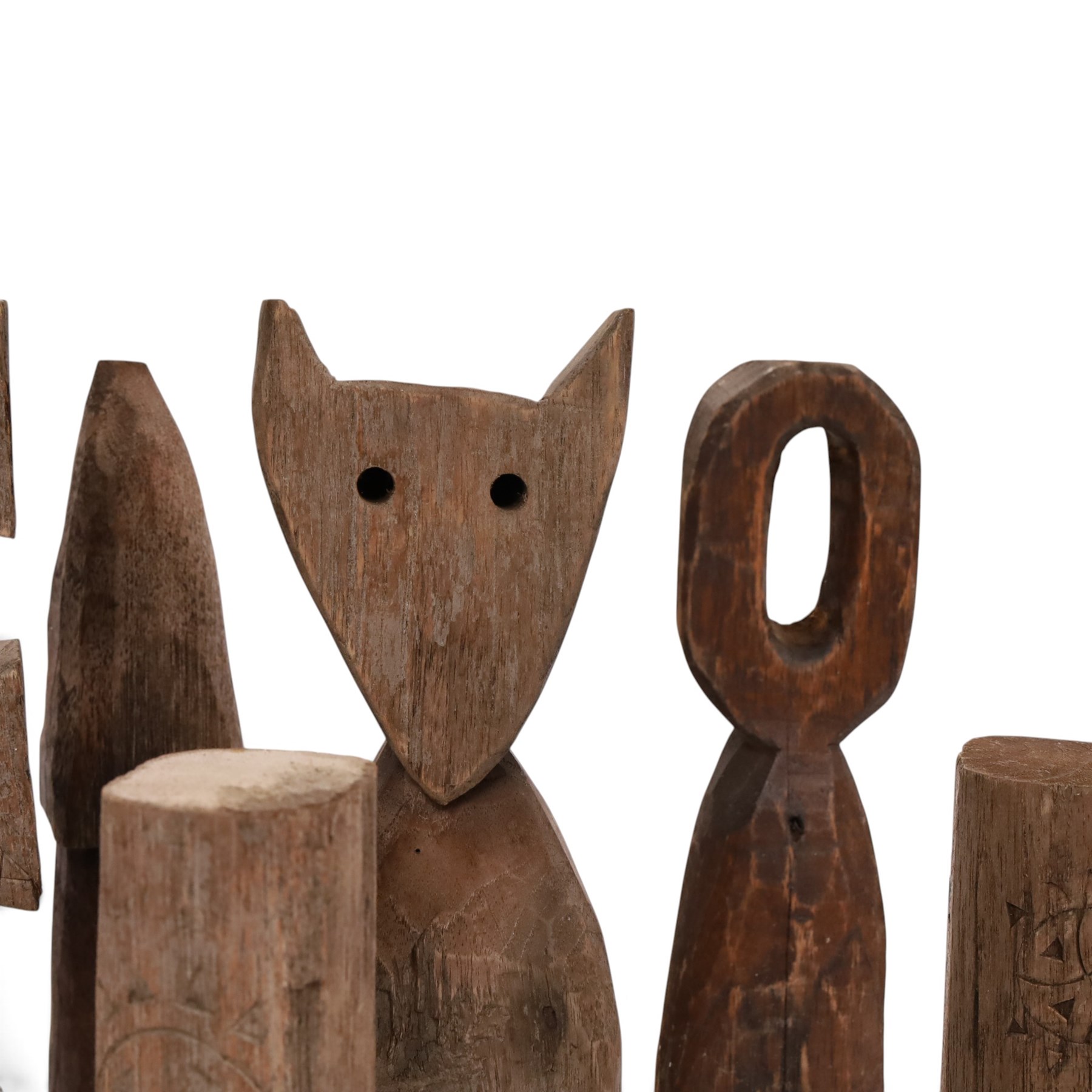 Hand carved folk art figures, including totems, mushroom and cat, largest H34cm