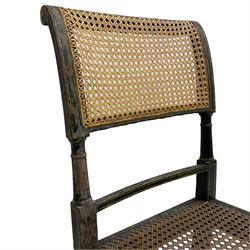 Collection of Regency dining chairs - set of four Regency painted beech dining chairs, with cane seat and back, on collar turned supports with splayed feet (W46cm, H84cm); a pair of Regency ebonised dining chairs (W47cm, H77cm); and a single Regency dining chair, the cresting rail painted with floral cornucopias and central putto vignette, X-frame back over cane seat, on collar turned front supports painted with foliage (W46cm, H84cm) (7)