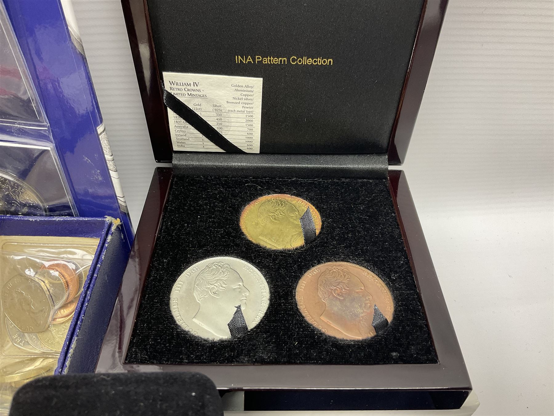 Commemorative and other coinage, including various Queen Elizabeth II 'London 2012 sports collection' fifty pence coins on cards, commemorative crowns, Millennium 2000 'Time Capsule' coin set, channel islands old round one pound coins, part sets etc