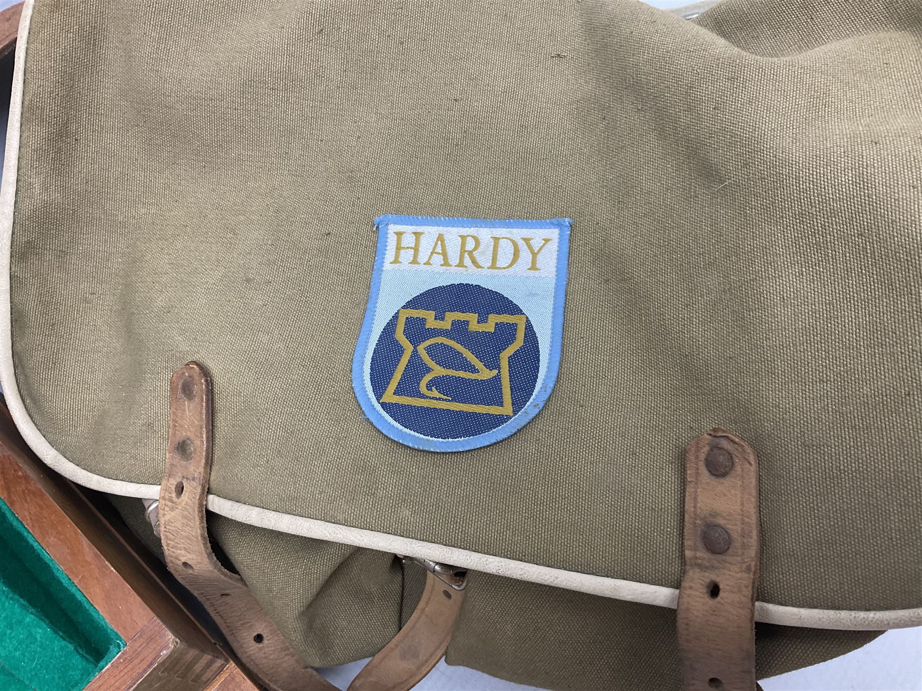 Four Abu fishing reels, comprising Ambassadeur 9000, Ambassadeur 7000, Ambassadeur 5500 and Ambassadeur 6500, together with additional line, hardy fishing bag and two wooden boxes