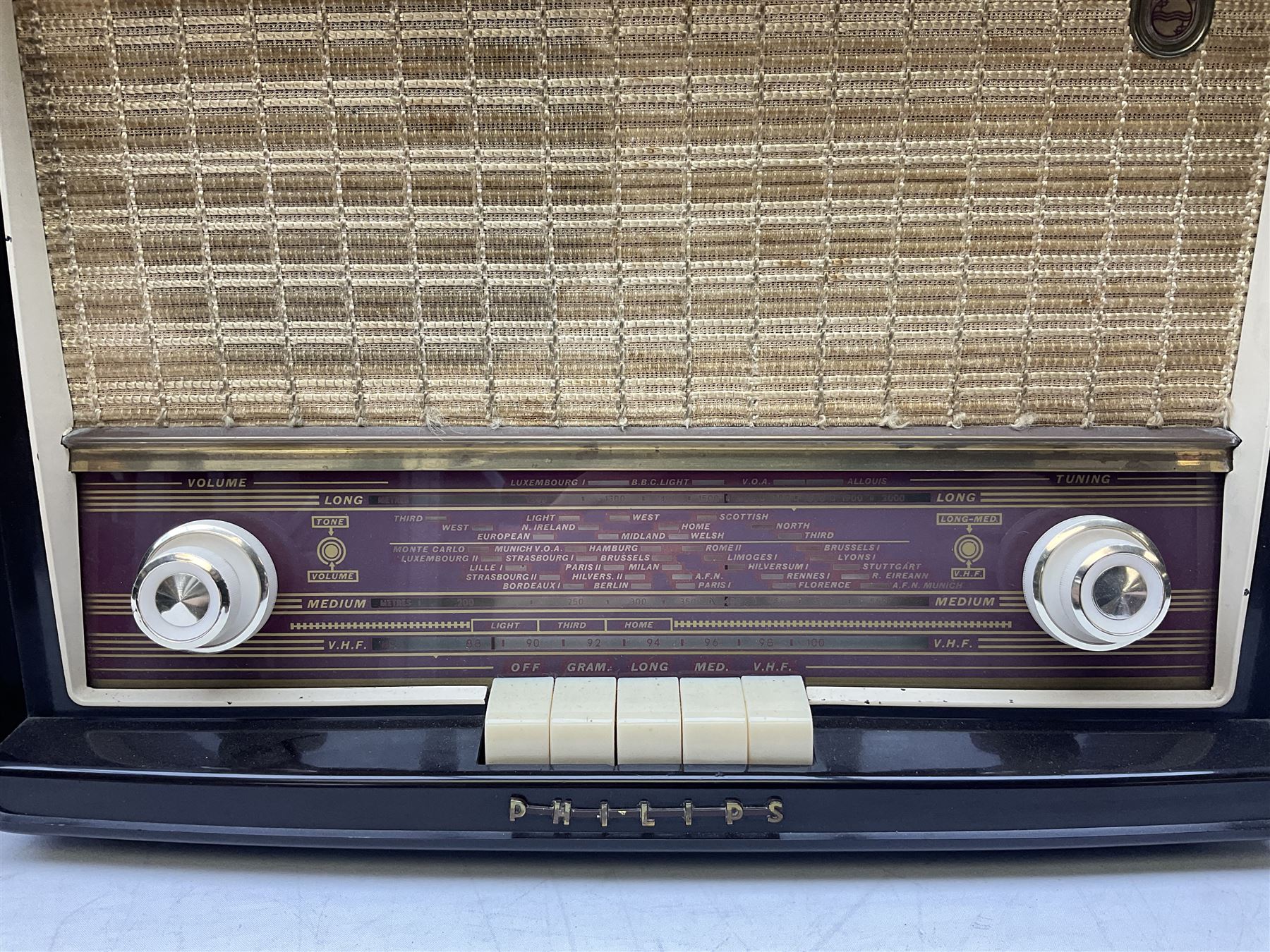 1950s Philips valve radio model B3G63A in brown Bakelite case, W42cm D21cm H30cm, together with 1950s Cossor Melody Maker model 524 radio and 1950s Grundig model 2041, tallest H35.5cm