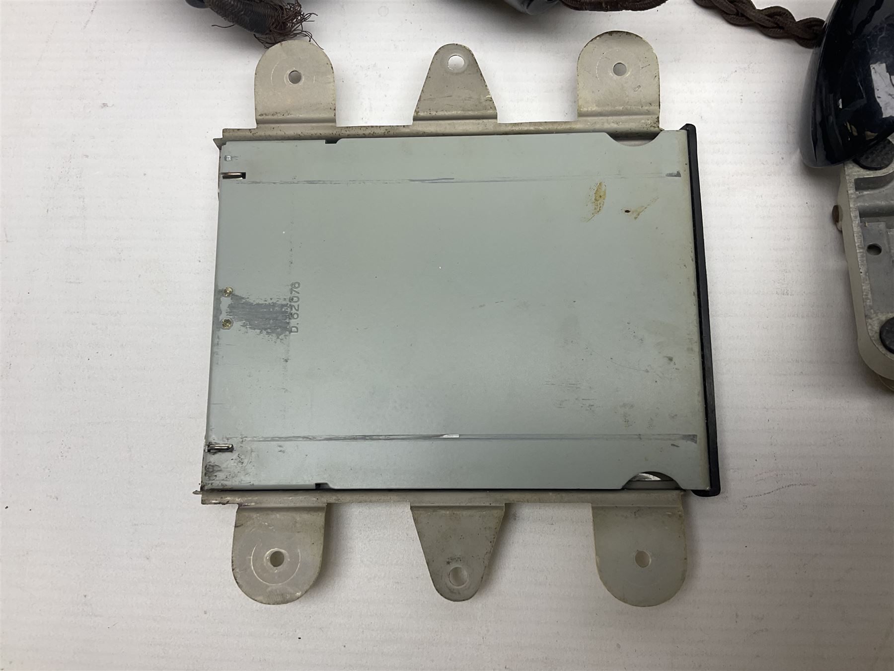 Collection of phone headsets, including GPO bakelite examples, together with other telephone parts 