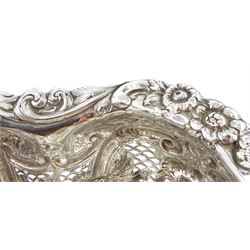 Silver table centre piece, embossed foliate and open fretwork decoration hallmarked S C Younge & Co, Sheffield 1827, with later modification (re-struck by the London Assay office 2021), approx  45.1oz, height 23cm