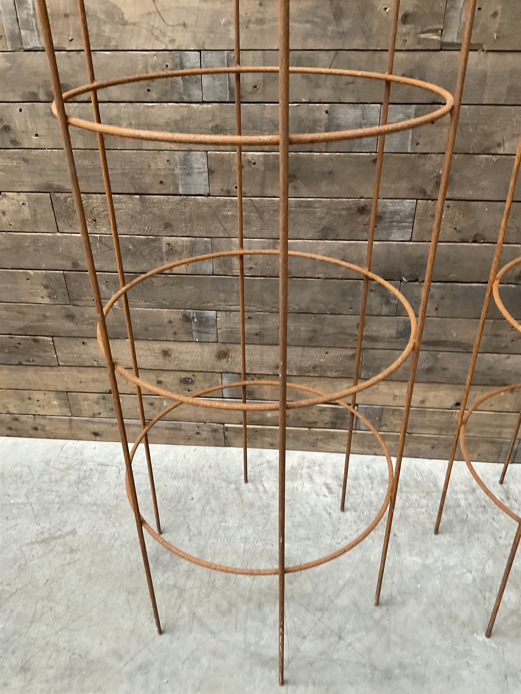 Pair of Country House wrought iron garden obelisks with ball finial, raise in four tiers