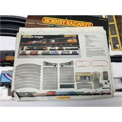Hornby '00' gauge - Midnight Freight electric train set with Class 58 diesel Co-Co locomotive No.58001, eight wagons, goods shed, track, car loading ramp and power controller etc; boxed with paperwork; together with an additional wagon, figures and platform fencing