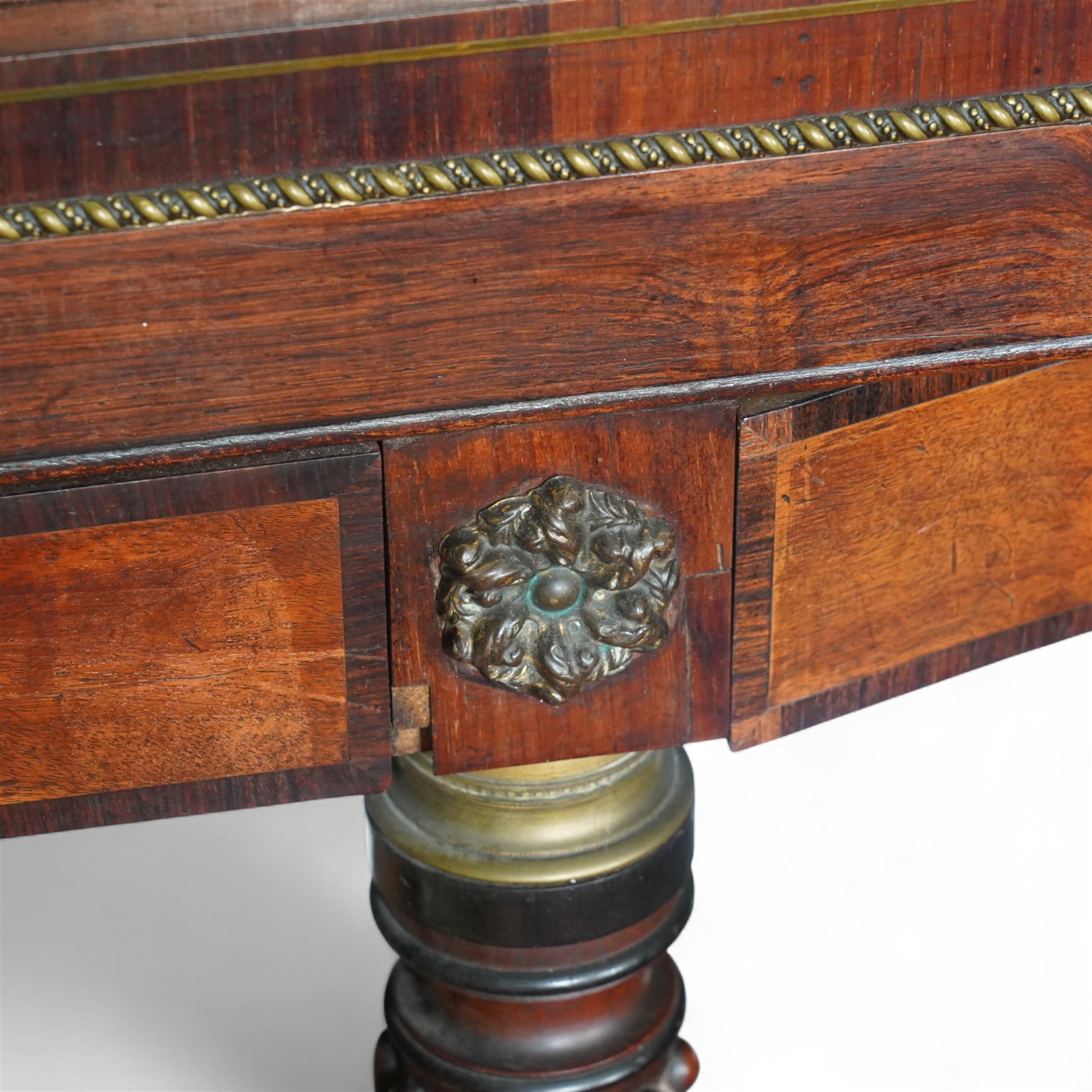 Early 19th century George IV Square Piano by William Rolfe & Co, 112 Cheapside, London, c1821. Mahogany veneered case with rosewood crossbanding and brass stringing, with sustain pedal and reeded legs on a tapered spiral with brass capitals, with three music draws beneath and a folding duet music stand, nameboard with makers name on a round gilt medallion and open silk backed fretwork to the ends, serial No 6699, double strung, English double action with 68 ivory and ebony keys, F1-C7. original strings, hammers and dampers, soundboard and bridge in good condition, with original makers written instructions on regulating the action and tuning the piano attached to the inside of the instrument. In good condition, however the action is in need of regulation and tuning.
William Rolfe is thought to have been in business between 1785 and 1828. 
Given the intricate nature of these historic instruments, specialist support will be available if required, to assist successful buyers with safe removal and onward handling. Price upon application.


This item has been registered for sale under section 10 of the APHA Ivory Act Reference PB6GL6SZ