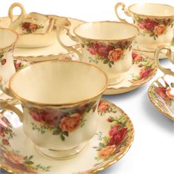 Royal Albert Old Country roses part tea and dinner service, including teapot, milk jug, open sucrier, cake stand, six dinner plates, etc