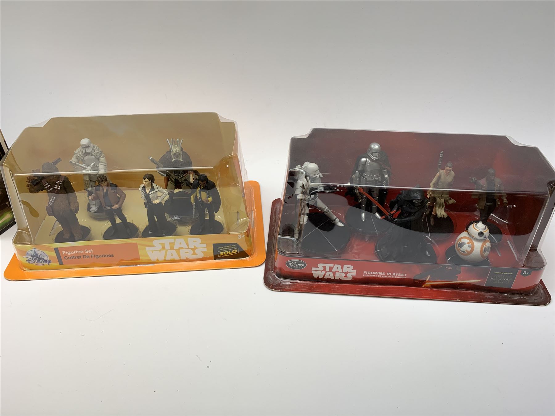 Star Wars - Disney Store The Force Awakens figurine playset, Poe's X-Wing Fighter, Snowspeeder and First Order Tie Fighter; Solo figurine set; The Last Jedi Elite Series die-cast action figure of Praetorian Guard; all mint and boxed; together with Star Wars Episode 1 card game, boxed (7)