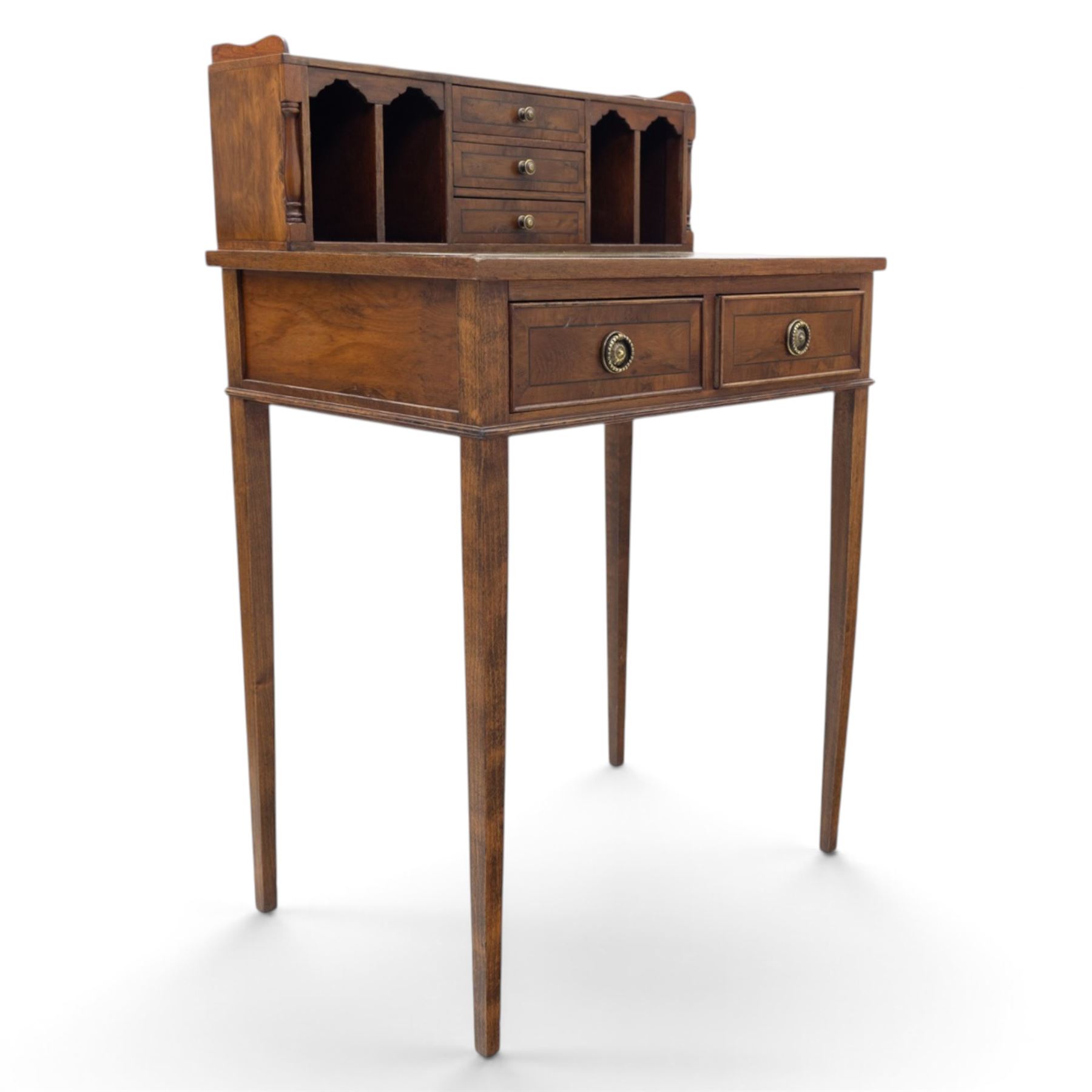 Small Edwardian writing desk, with raised back with three fitted drawers and pigeon holes, above a green tooled leather writing surface, two short drawers with brass ring pulls, square tapering supports
