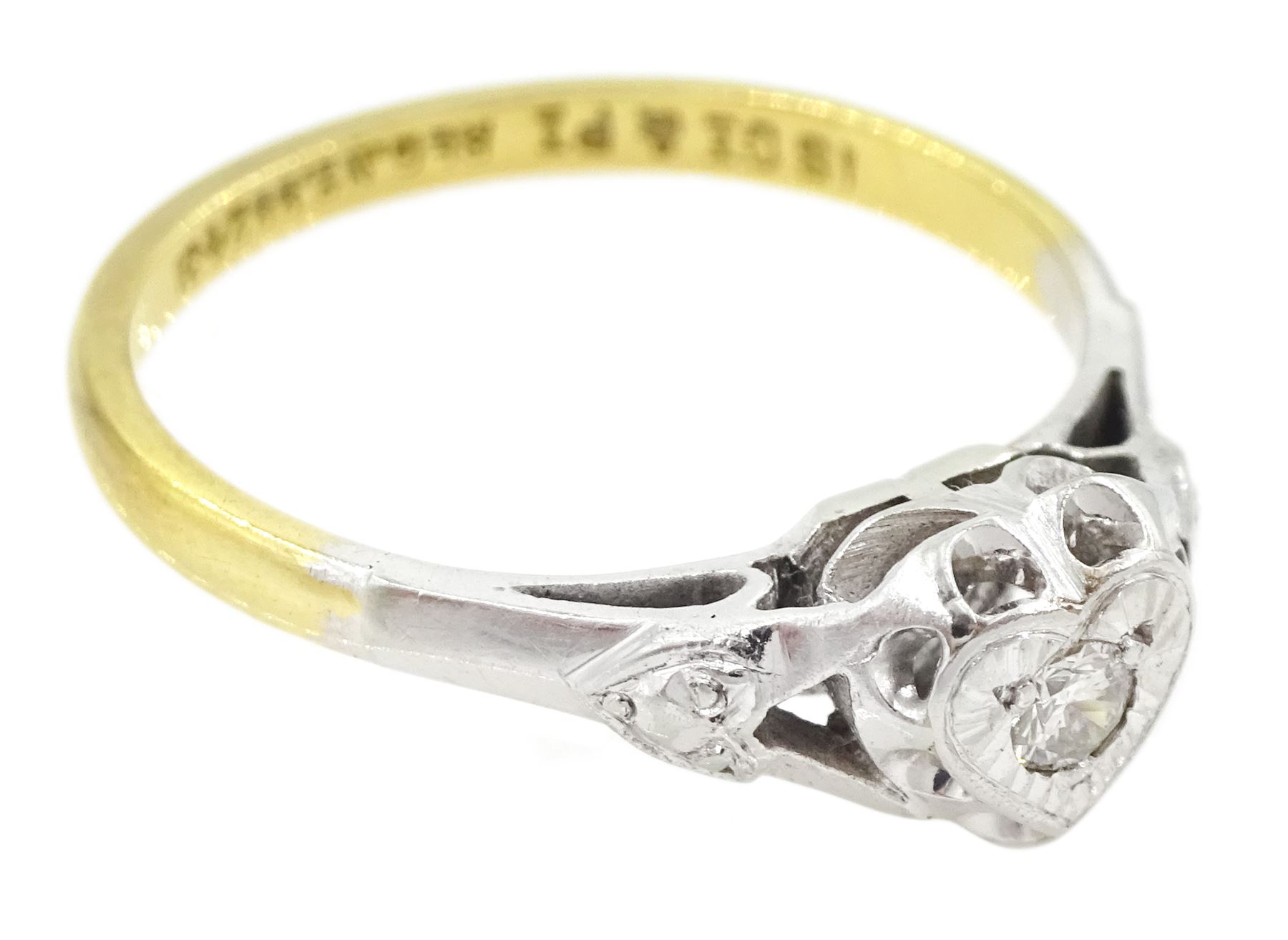 Single stone round brilliant cut diamond, heart shaped ring, stamped 18ct Plat