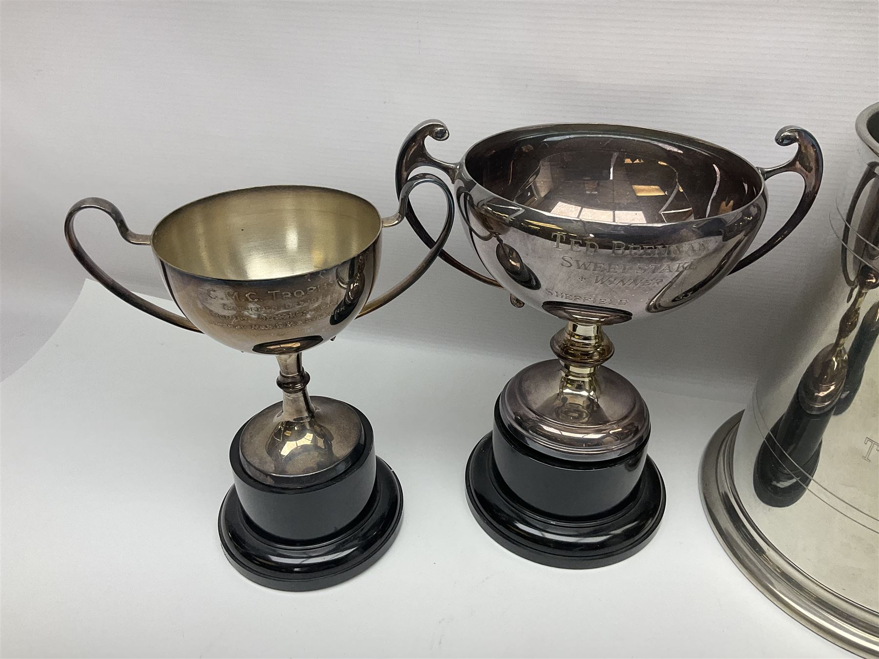 Collection of pewter and silver-plated trophy cups and presentation tankards, largest H28cm
