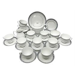 Royal Worcester Beaufort tea service, comprising teapot, milk jug, open saucier, eleven teacups, twelve saucers, eight dessert plates and one cake plate