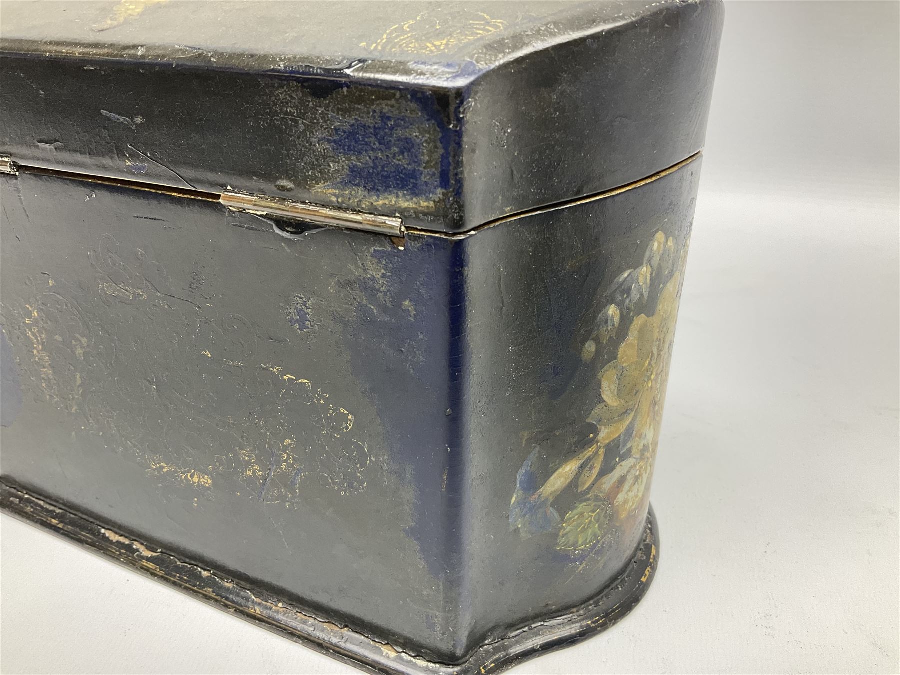 Victorian papier-mâché stationary box, of rounded wedge form with mother of pearl escutcheon, the hinged and curved cover and sides hand painted with floral sprays, opening to reveal a lined and fitted interior, H15cm L22cm D16cm