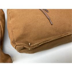 WW2 British Army RAMC 'Regimental Medical Pannier', well marked externally and dated 1941, stamped May 1943 internally, canvas covered wicker form with leather edges, hinged top and fall front with two rope carrying handles, fitted iron locking straps with securing chains; contains various unused field dressings and bandages with WW2 dates and two pillows; original label under lid L79cm