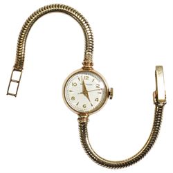 9ct gold ladies manual wind Waltham wristwatch, on 9ct gold articulated strap, with P.S Ph...