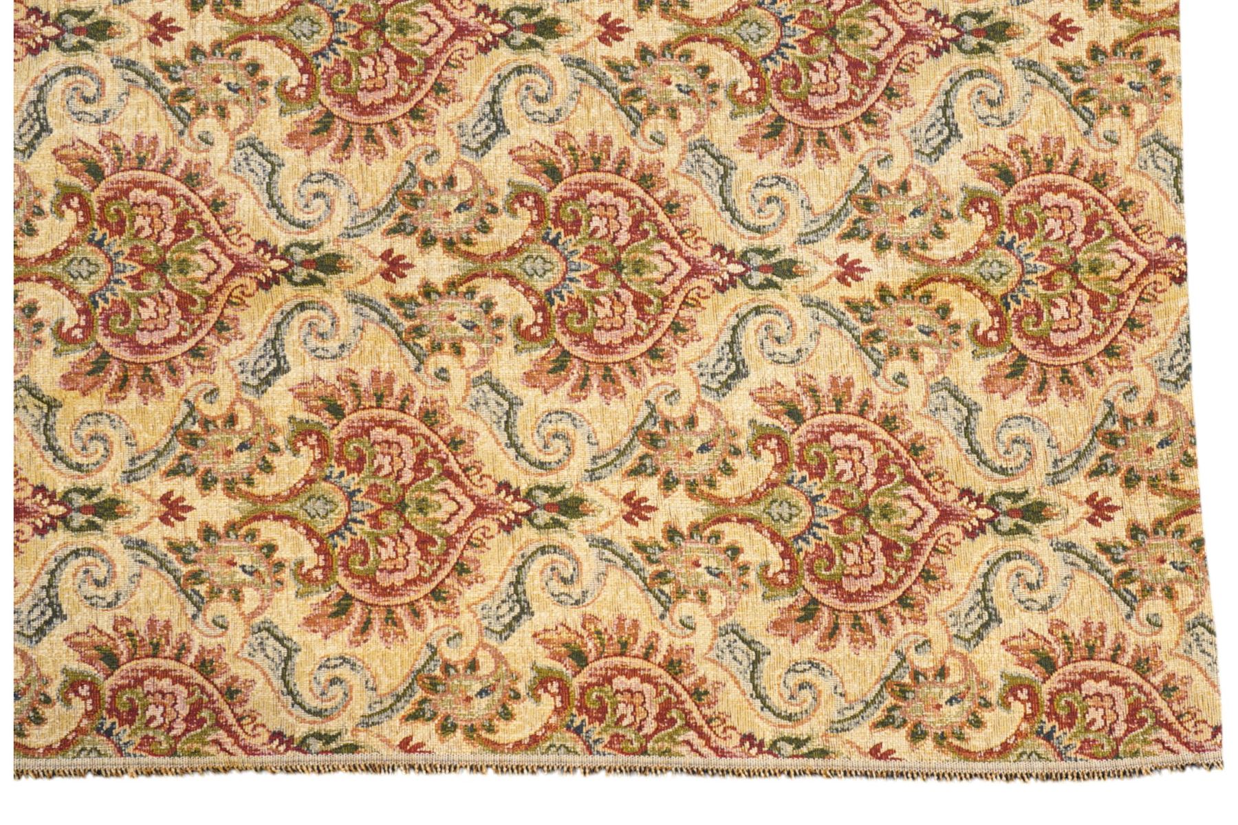 Pale golden ground chenille fabric section, decorated with repeat stylised plant motifs and trailing scrolls