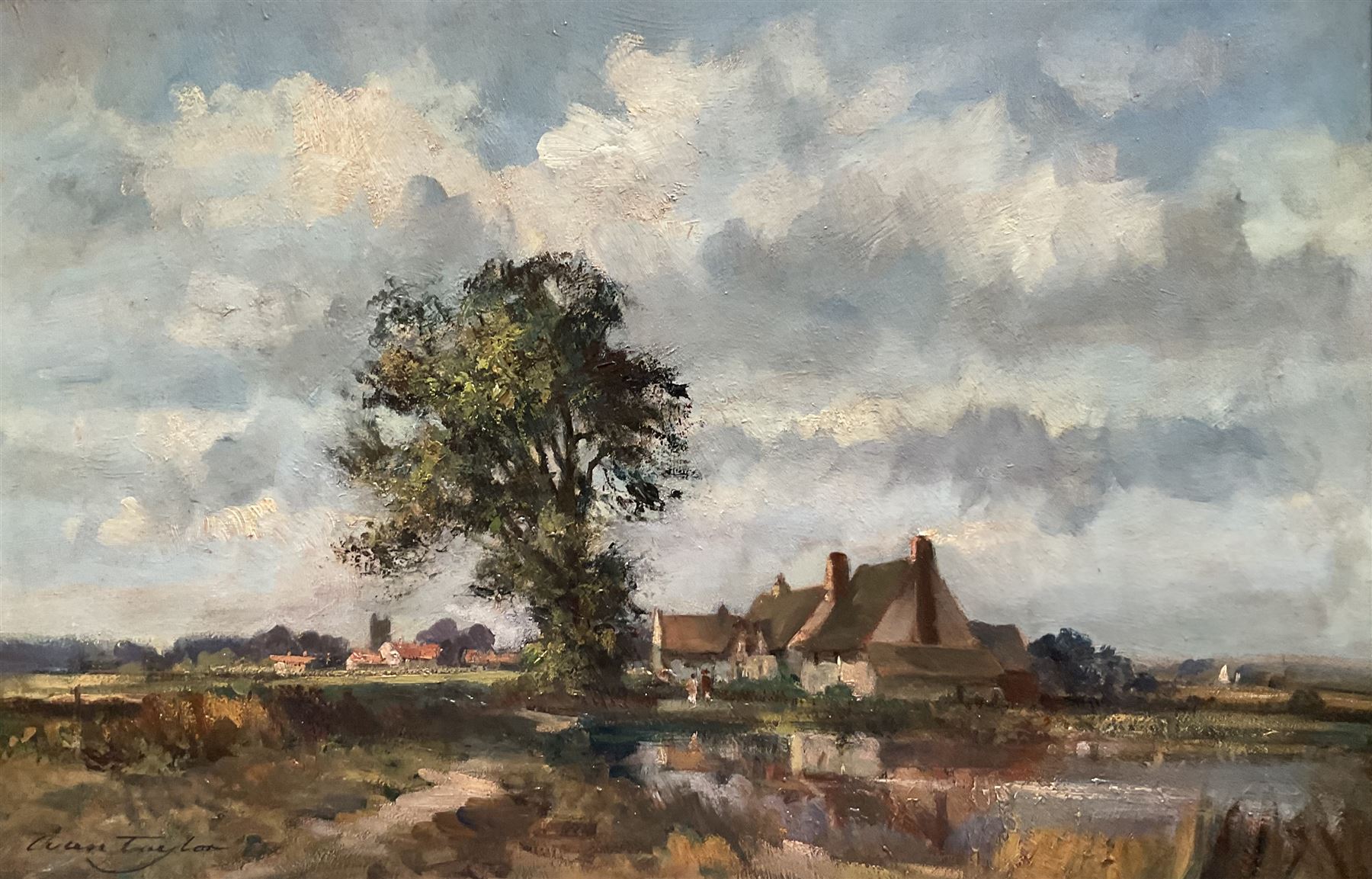 Ivan Taylor (British 1946-): Fields and Town Church, oil on canvas signed 49cm x 74cm 