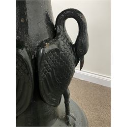 Victorian style large green painted cast iron garden fountain, three graduating shallow bowls with egg and dart moulded edge, the base with three heron figure mounts, W114cm, H240cm