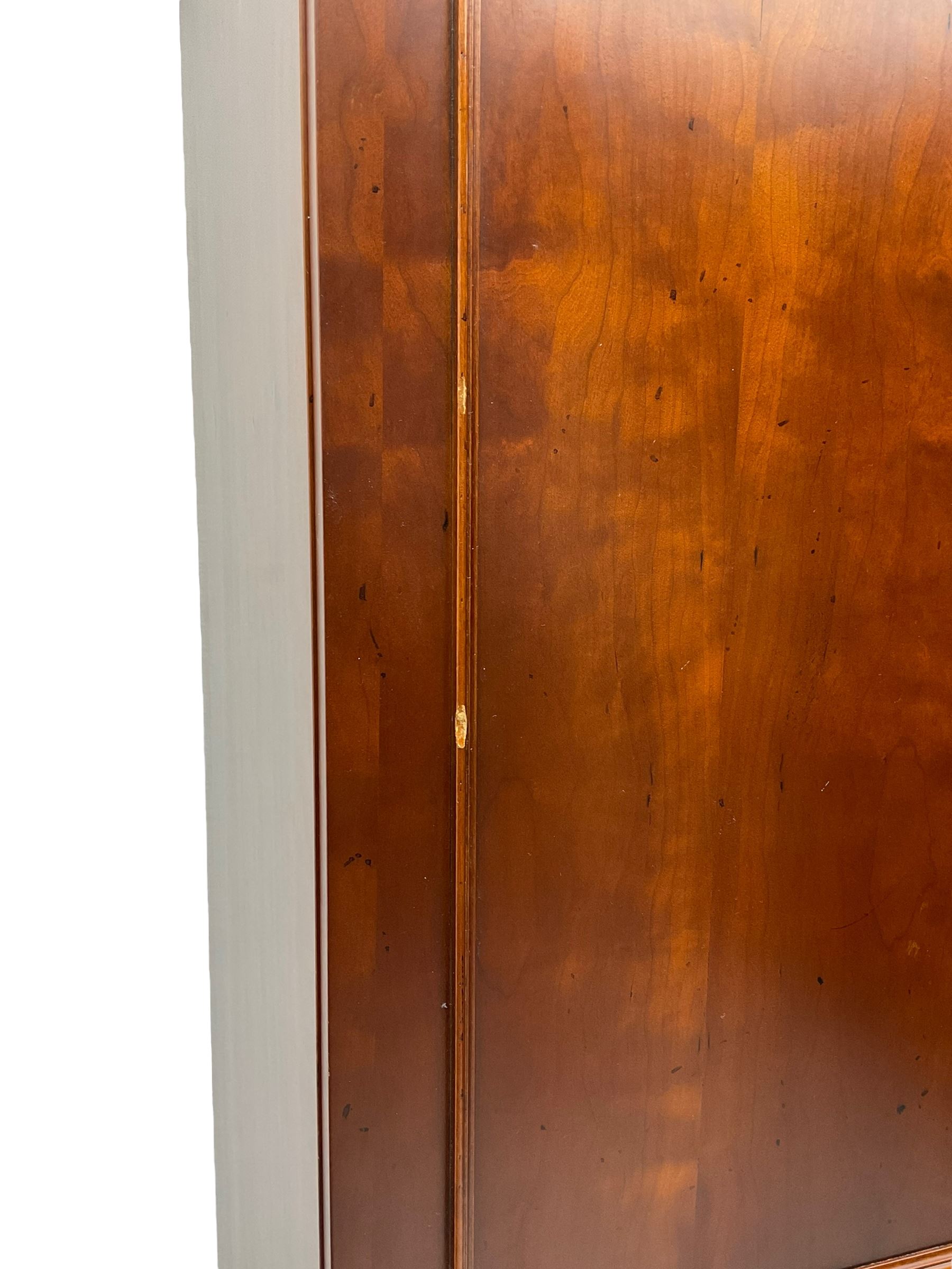 Cherrywood double wardrobe, the interior fitted with hanging rail and shelf