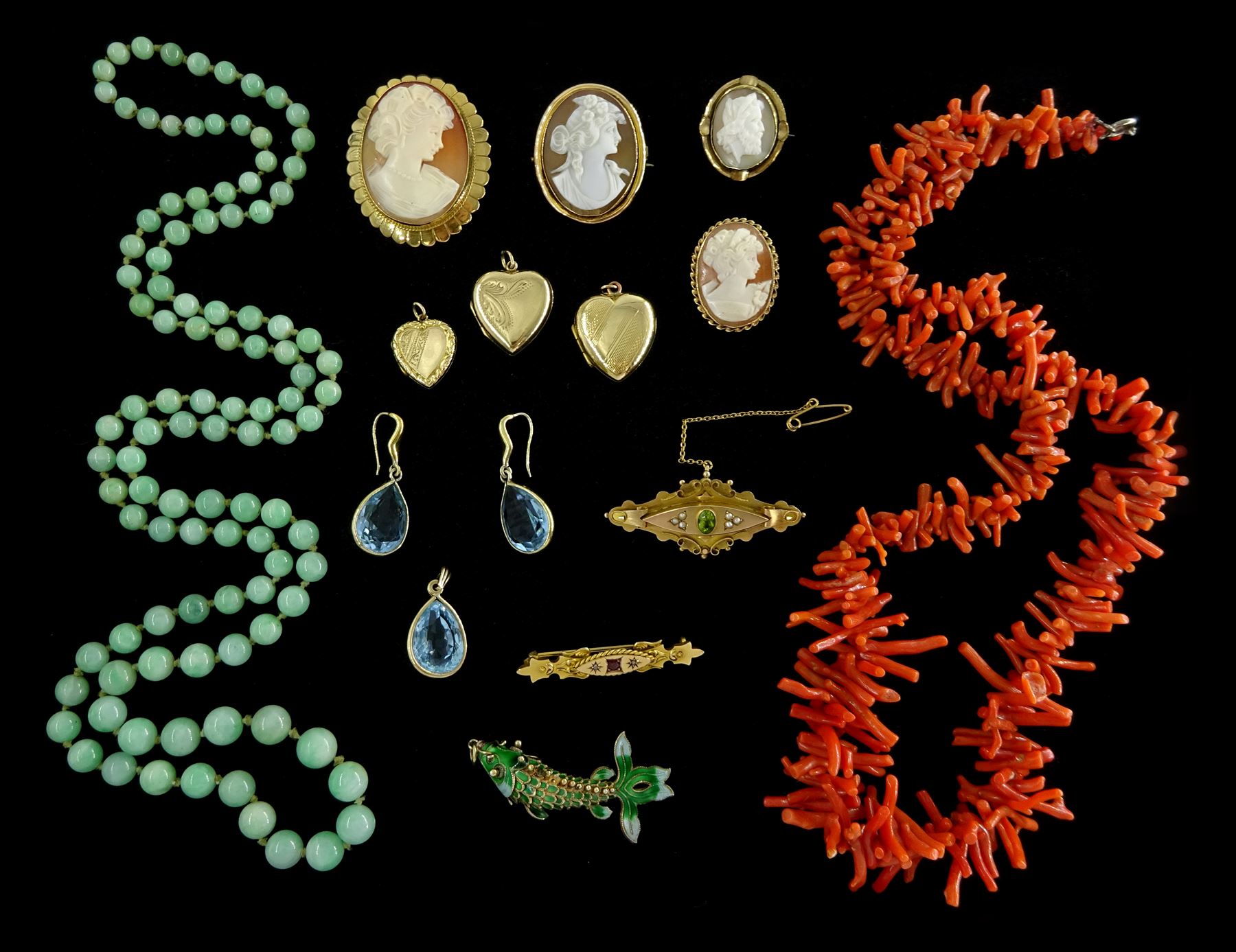 Edwardian and later jewellery including gold peridot and seed pearl brooch, three gold cameo brooches and a gold garnet and diamond brooch, all 9ct, jade bead necklace, three gilt heart locket pendants, articulated fish, coral necklace and other costume jewellery