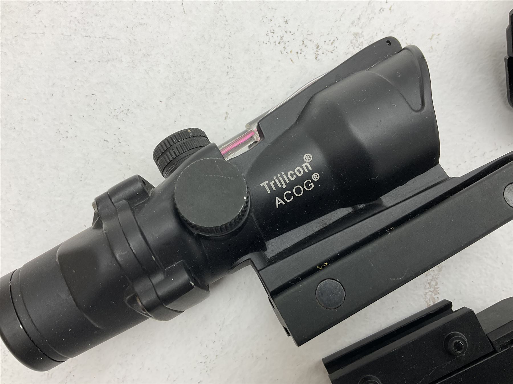 Combat Machine lithium battery powered airsoft BB rifle, 'Complete AEG Series' to fire 5mm pellets, with adjustable length stock L69cm non-extended; with six magazines, Trijicon ACOG red dot telescopic sight, battery charger etc (NO BATTERIES)