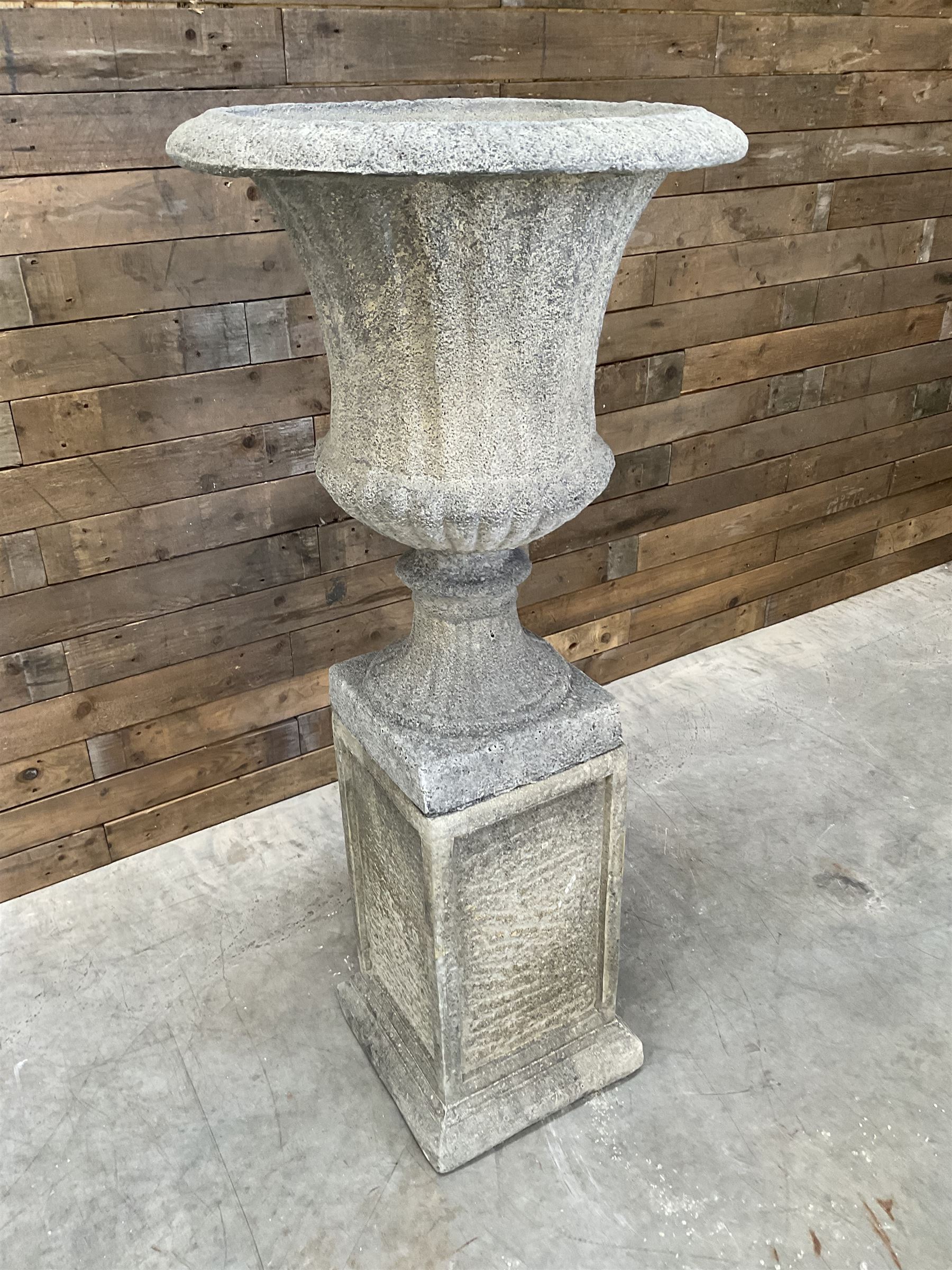 Large Georgian design cast stone garden centre-piece urn, egg and dart border, tapering column on square base, raised on square column