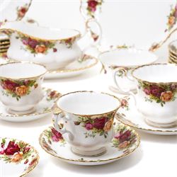 Royal Albert Old Country Roses tea and dinner ware comprising six dinner plates, five dessert bowls, sauce boat and stand, four breakfast cups and saucers, three tea cups and four saucers, six tea plates, milk jug, sugar bowl and bread and butter plate