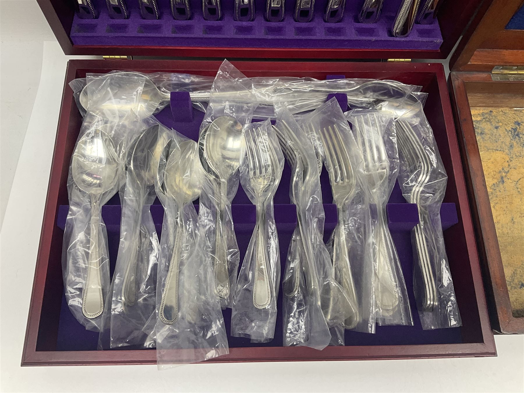 Arthur Price canteen of 18/10 stainless cutlery, together with another box
