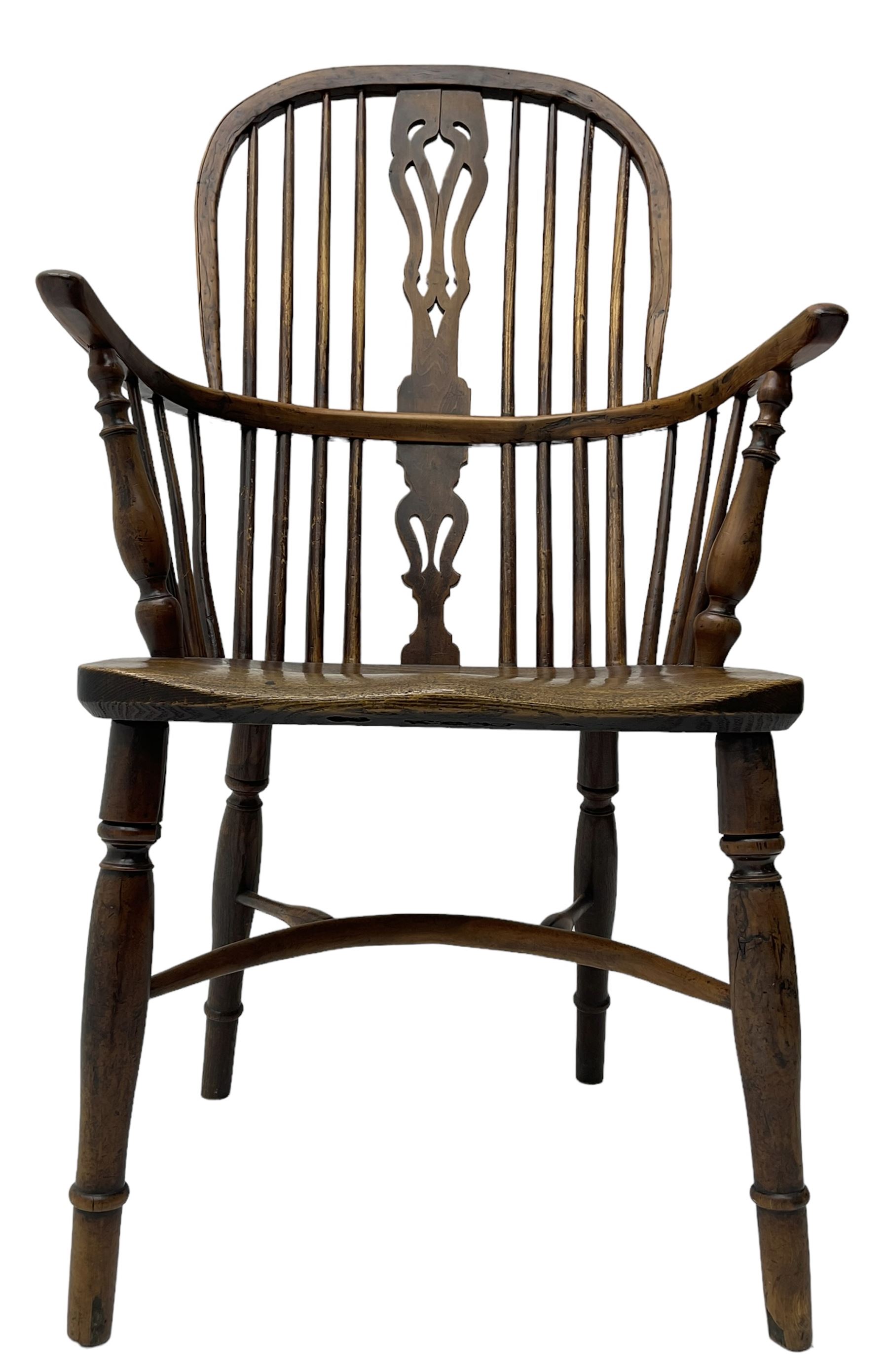19th century yew wood and elm Windsor chair, high hoop and stick back with pierced splat over dished seat, raised on ring turned supports united by crinoline stretcher