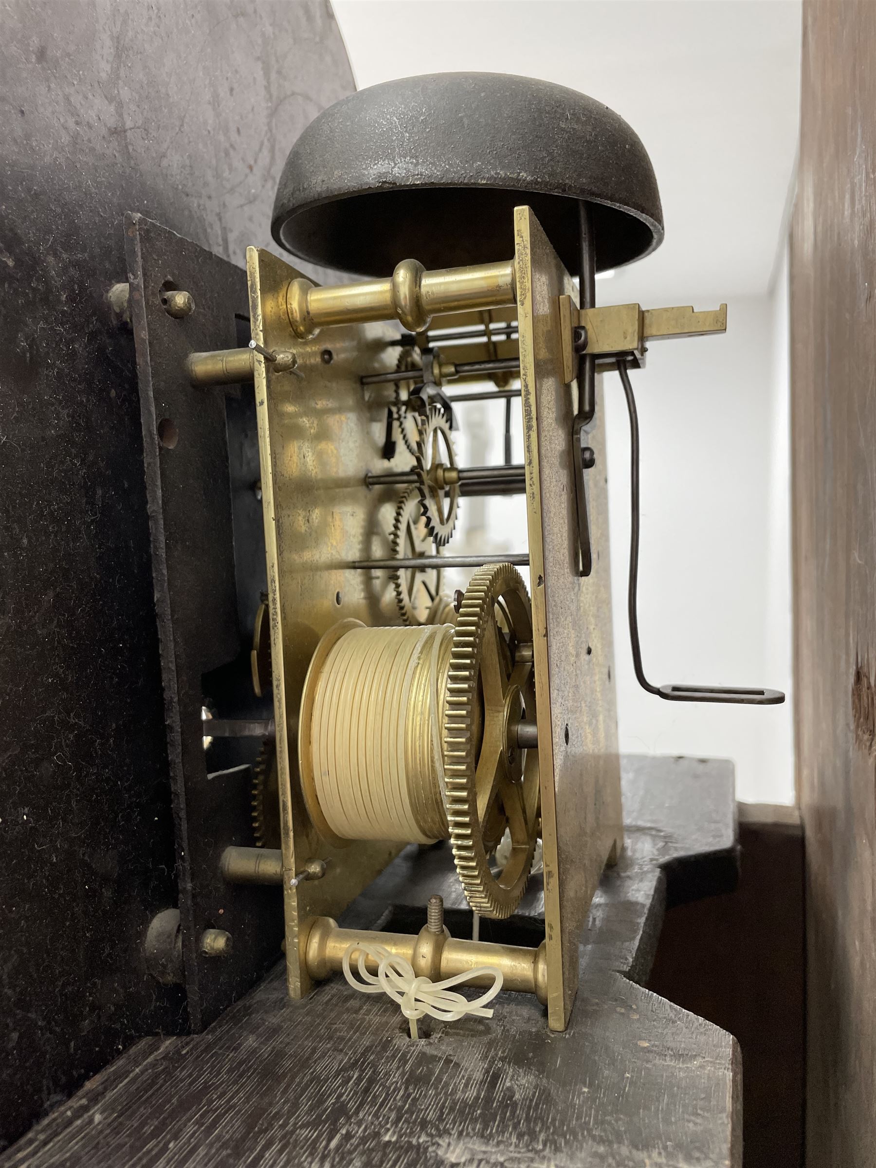 Early 19th century oak longcase clock, the enamel dial decorated with raised gilt trailing scrolls, signed 'Amyot & Bennett, Norwich', 8-day movement striking on bell