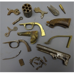 Relic Revolver and other gun parts, not checked for completeness   
