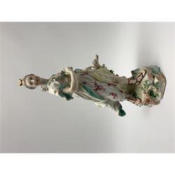 Mid 18th century Derby porcelain figure modelled as Dianna the Huntress, with quiver of arrows upon her back and dog by her side, upon a naturalistically modelled base, with patch marks beneath and collectors labels, H26cm