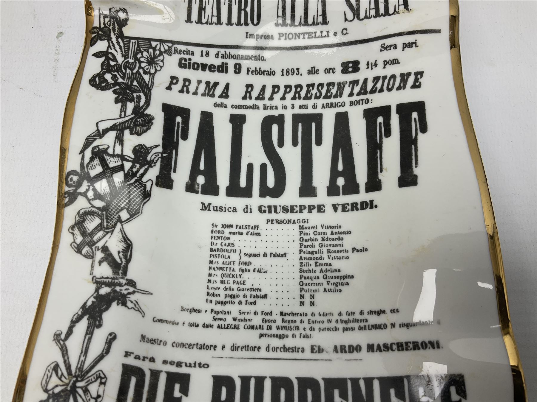 Fornasetti rectangular 'Falstaff' operatic billboard ashtray decorated with black and white text with a gilt border edge,  with printed mark beneath, H22cm 