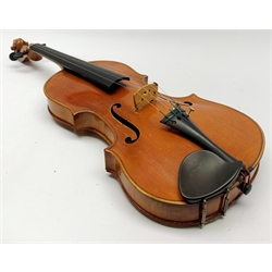  Late 19th century violin with 36cm maple back and spruce top, bears label 'Copy George Klotz Made in 1747', L59cm overall, in ebonised wooden carrying case with two bows  