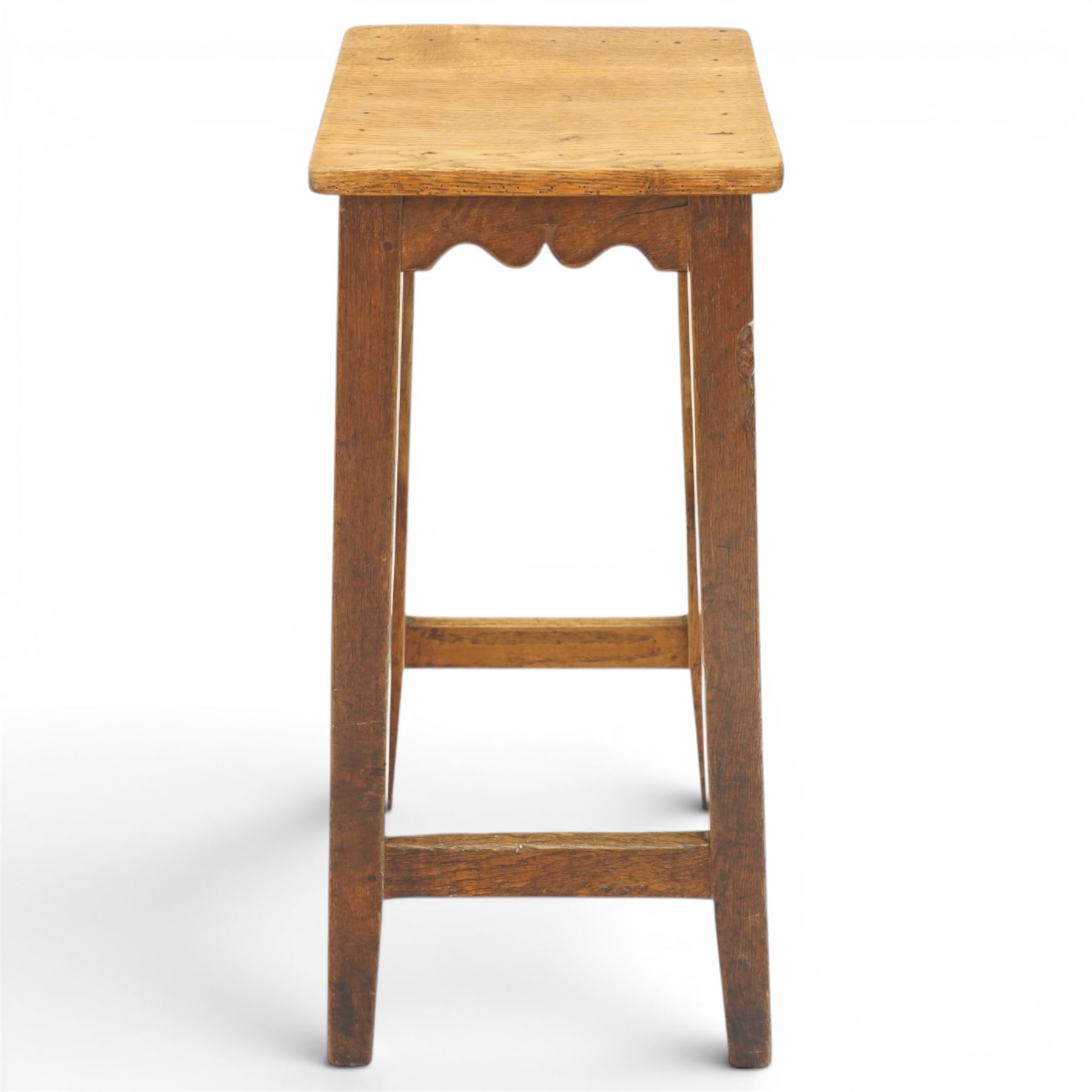 Mouseman - circa 1940/50's oak bar stool, dished square top with shaped apron, raised on four tapering square legs, joined by rails, with carved mouse signature, by Robert Thompson of Kilburn, initialled with provenance from the Old Hall, Thornton-le-Dale, North Yorkshire, further info to follow