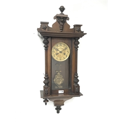  Late 19th century walnut cased Vienna style wall clock, twin train movement, with ornate decorated pendulum, H82cm  