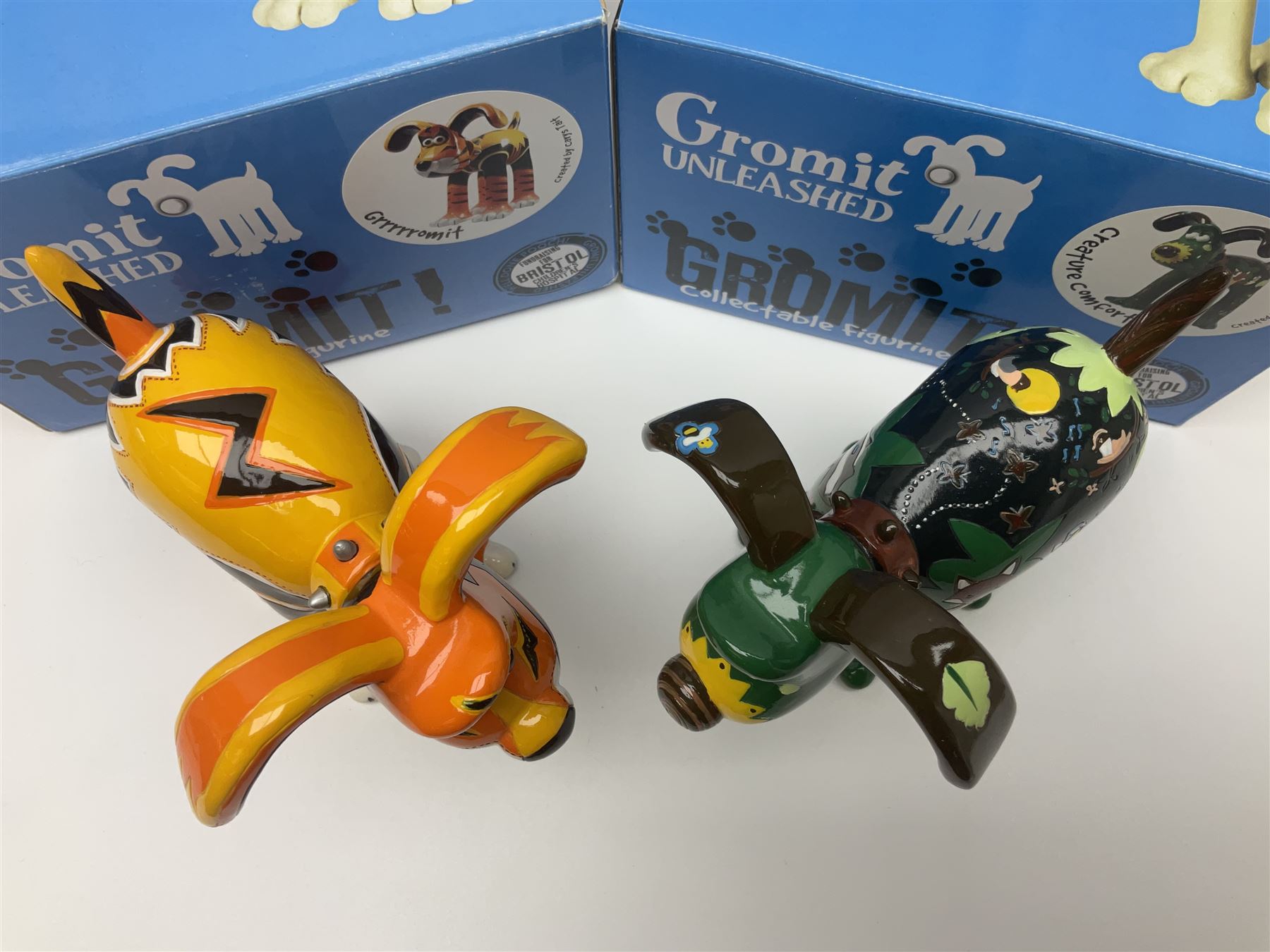 Wallace & Gromit - Gromit Unleashed: two Aardman Animations The Grand Appeal 'Gromit Unleashed' figures comprising Grrrrromit and Creature Comforts, both with boxes