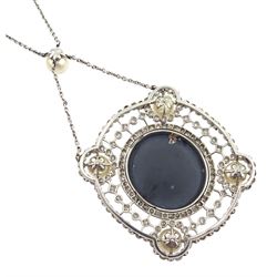 Early 20th century platinum milgrain set black opal, diamond and pearl pendant necklace, the central black opal with openwork diamond set border, each corner set with a pearl, suspending from a pearl and trace link necklace, retailed by Heming & Co, 28 Conduit Street, London, in fitted velvet and silk lined case