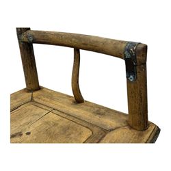 Late 19th century Chinese Qing dynasty high chair, rectangular back with central splat carved with stylised bat motif, applied brasswork to the arms and seat, on rounded supports with double stretcher