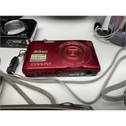 Nikon Coolpix 8700 camera body, serial no 3220838, with Zoom Nikkor Ed 8.9-71.2mm 1:2.8-4.2 lens, together with Canon digital video camcorder and other digital cameras and camera equipment