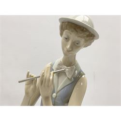Two Lladro figures, comprising Girl with Pheasant no 1055 and Flute Player no 1025, both with original boxes, largest example H40cm 