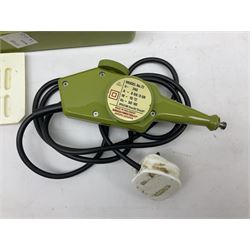 An electric mini drill with accessories, electric engraving tool, mini grinder, electric multi-tester, cutting knives and blades.