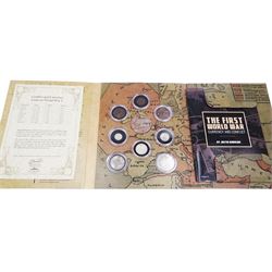 The Second World War 'Currency and Conflict' coin and banknote set including Bank of England Peppiatt one pound note 'U74D', 1942 half crown and other similar, together with three part coin sets, all in folders